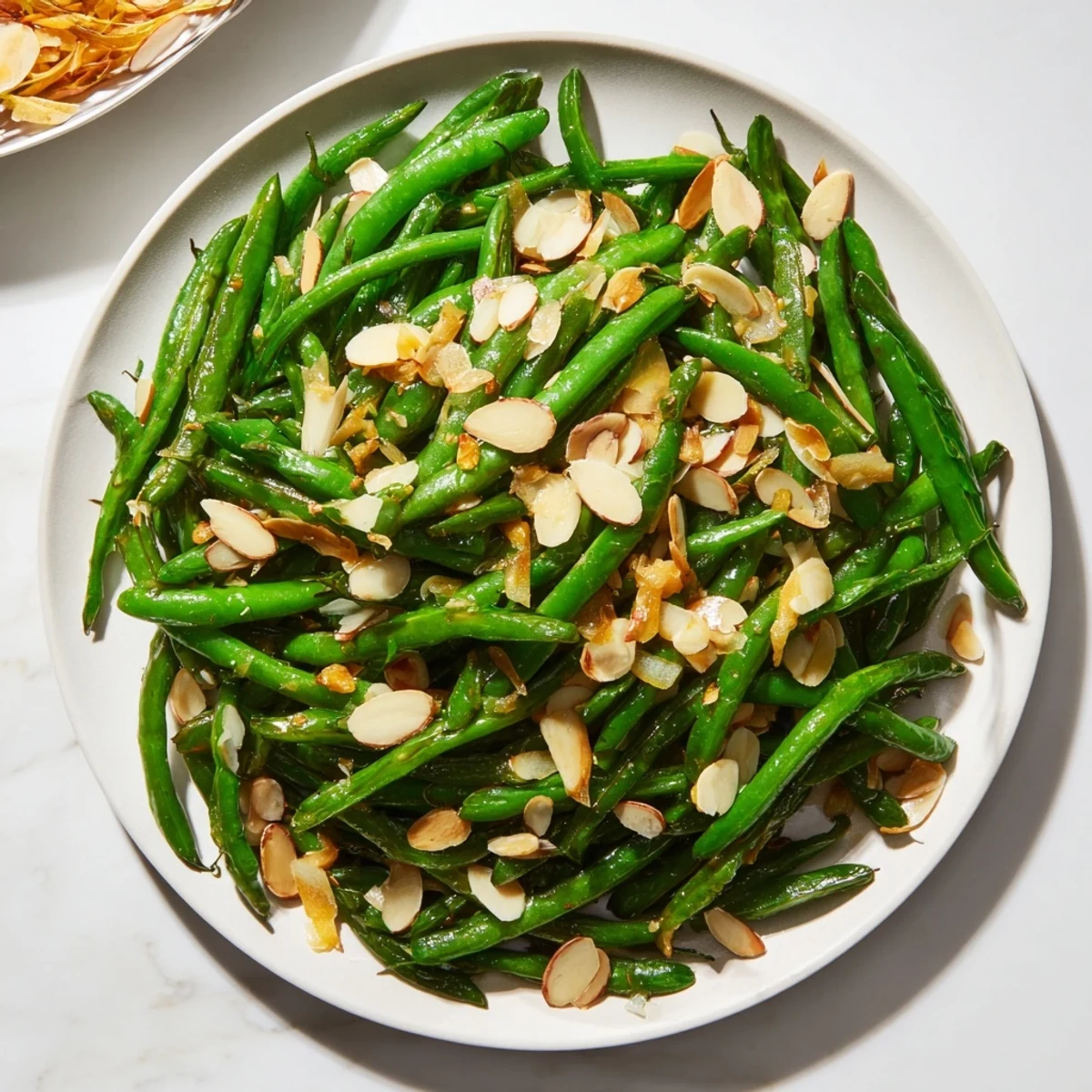 Enjoy these flavorful sautéed green beans with garlic, almonds, ready in 20 minutes with perfect textures.