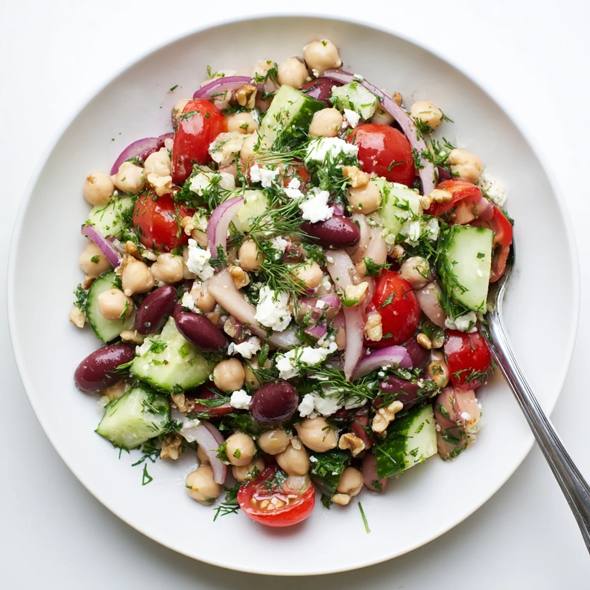 A refreshing bowl of Dense Bean Salad with a Sleepy Girl Mocktail twist, perfect for a relaxing dinner.