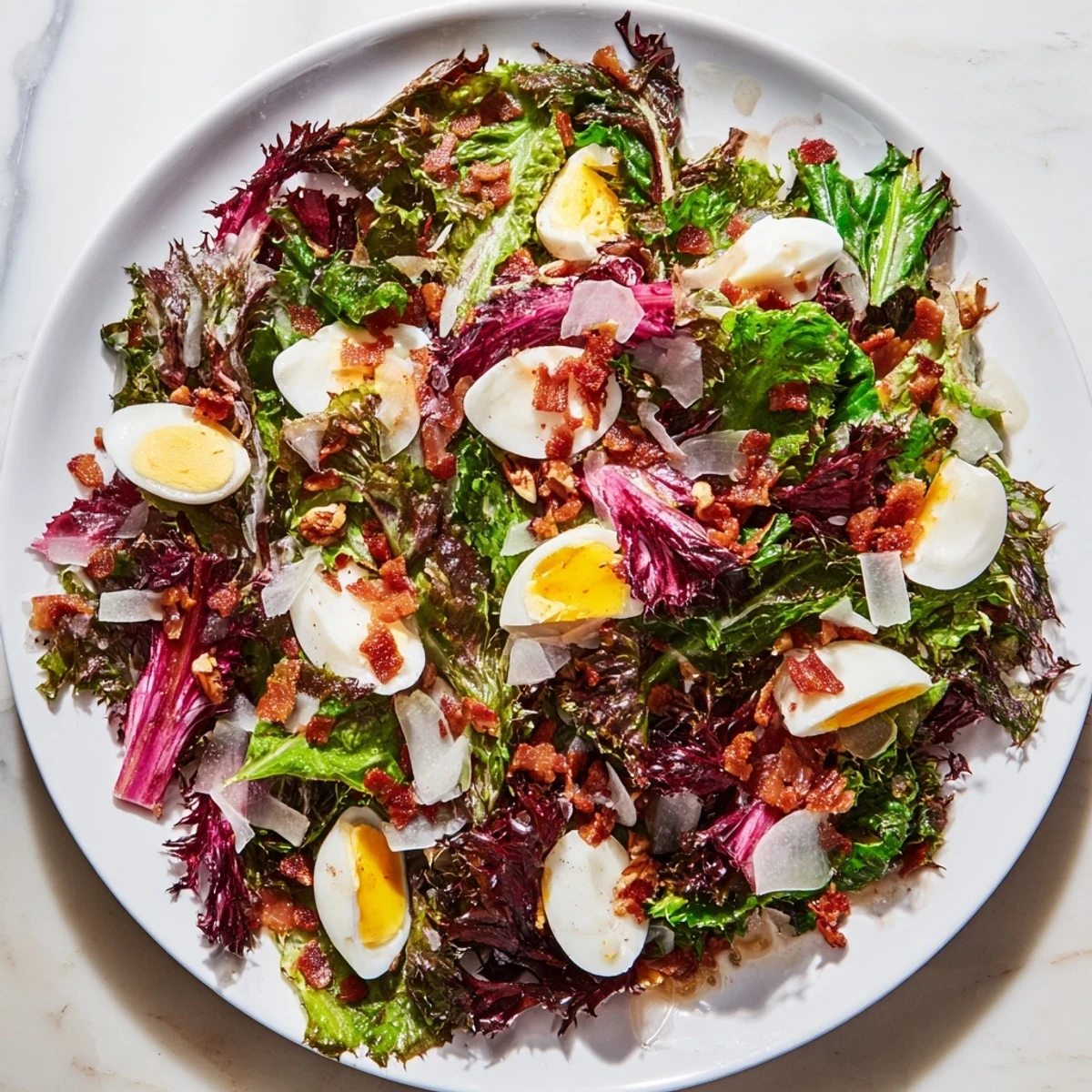 The visually appealing Bitter Greens Salad with warm bacon dressing, ready to eat, includes bacon bits.