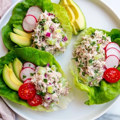Fresh tuna salad lettuce wraps, filled with creamy tuna and served in vibrant, green butter lettuce.