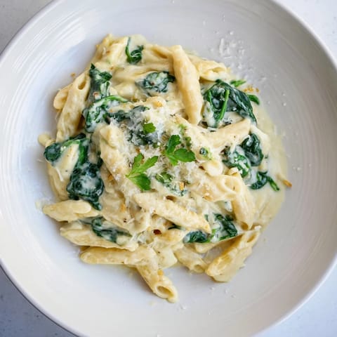 Imagine the Magic Casserole: Creamy Spinach Pasta, bubbling and golden with melted cheese.