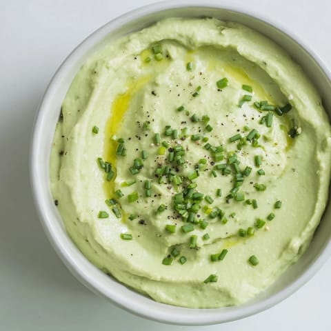 This homemade Avocado Cottage Cheese Dip features a smooth texture from avocado and cottage cheese.