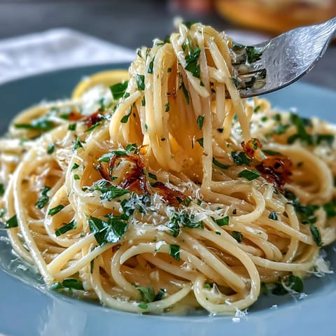 Bright Spring Pasta Limone with silky lemon-butter sauce, fresh basil, and parmesan.