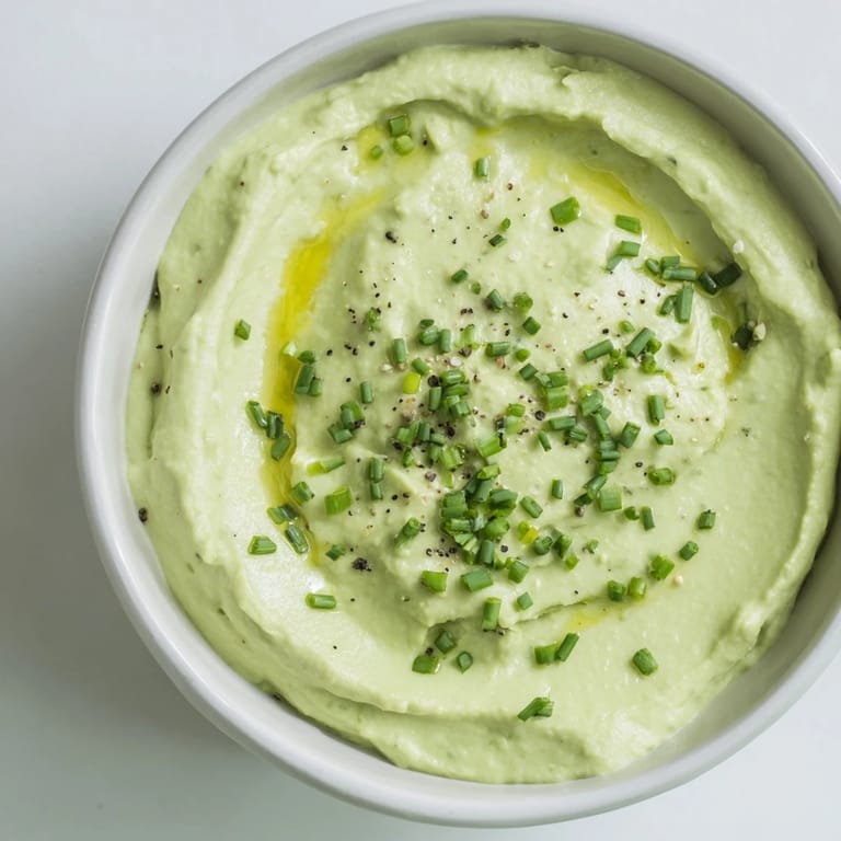 This homemade Avocado Cottage Cheese Dip features a smooth texture from avocado and cottage cheese.