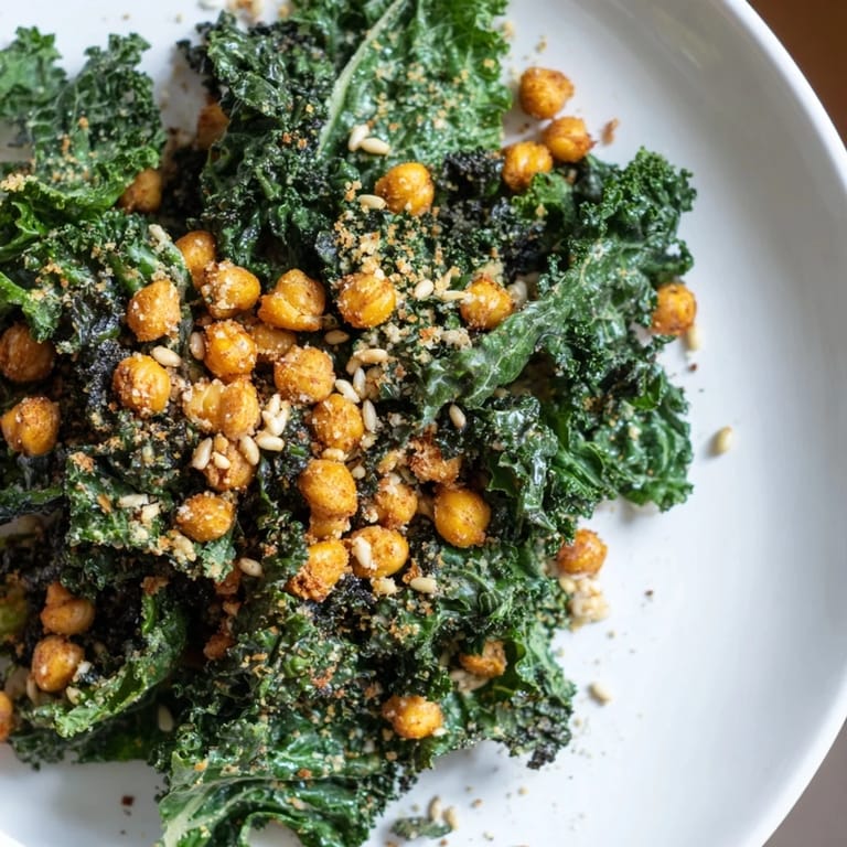 This warm Kale salad with crispy chickpeas shows the perfect mix of textures, from crunchy to tender.