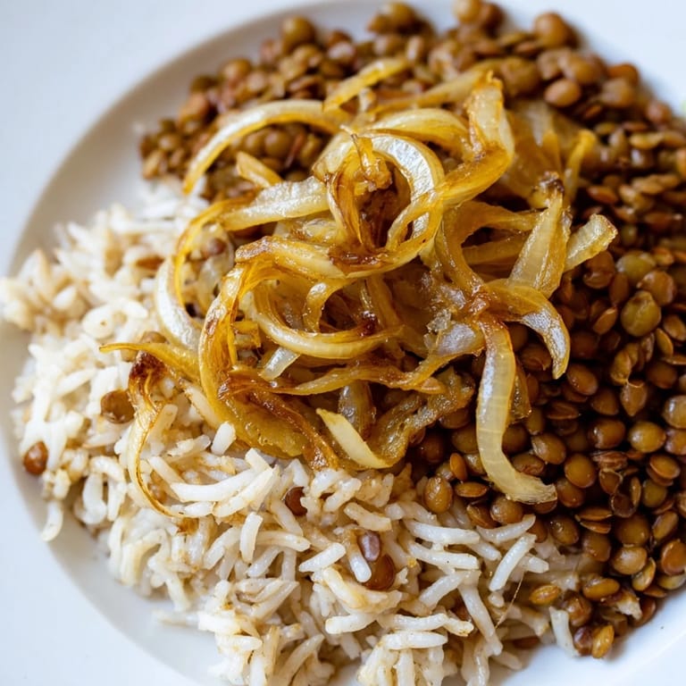 Hearty and wholesome: warm spices infuse this delicious Lebanese Mjadra featuring lentils and rice.